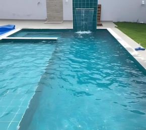Casa aconchegante com 3 quartos com piscina - Sem roupas de cama e banho, pets sujeito a taxa extra